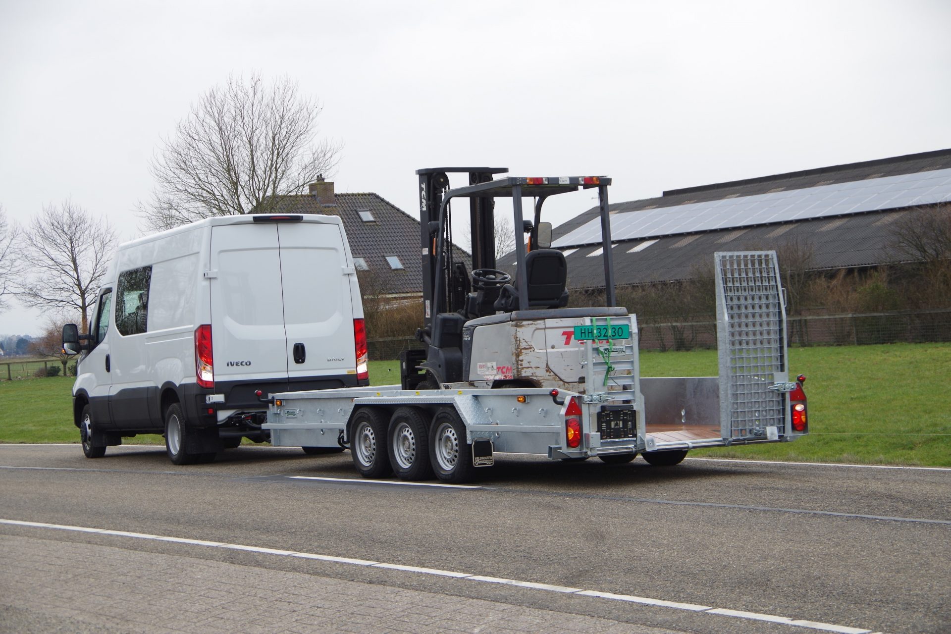 50 C18 met Tridem en 4,5T heftruck la 1